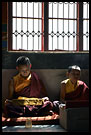 Monks under window, Golden Temple, Namdroling Monastery, South India