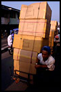 transporting goods on bike, Kerinci, Indonesia